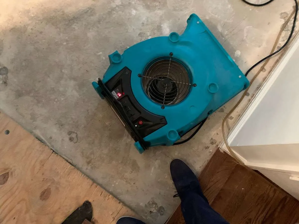 Air mover drying subfloor during Leak Detection & Repair in Orcutt
